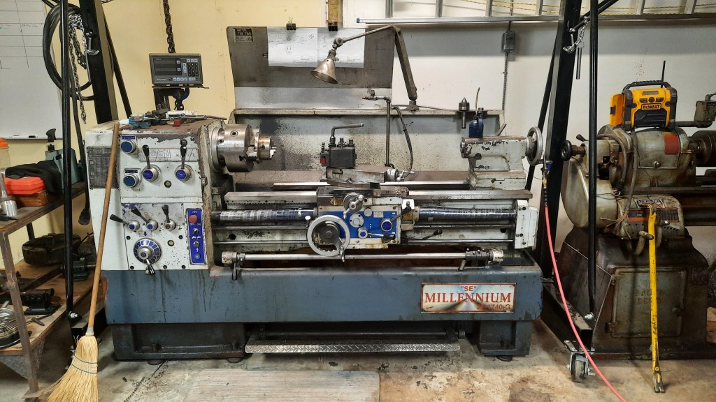 Millenium 17"x40" lathe with Mitutoyo digital readout, 3 and 4 jaw chucks, 5C collect chuck, 7.5HP, dual inch/metric threading. 